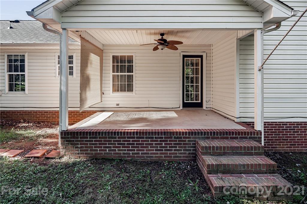 8577 Unity Church Road Denver, NC 28037 - Photo 26 of 33 a view of a house with a yard