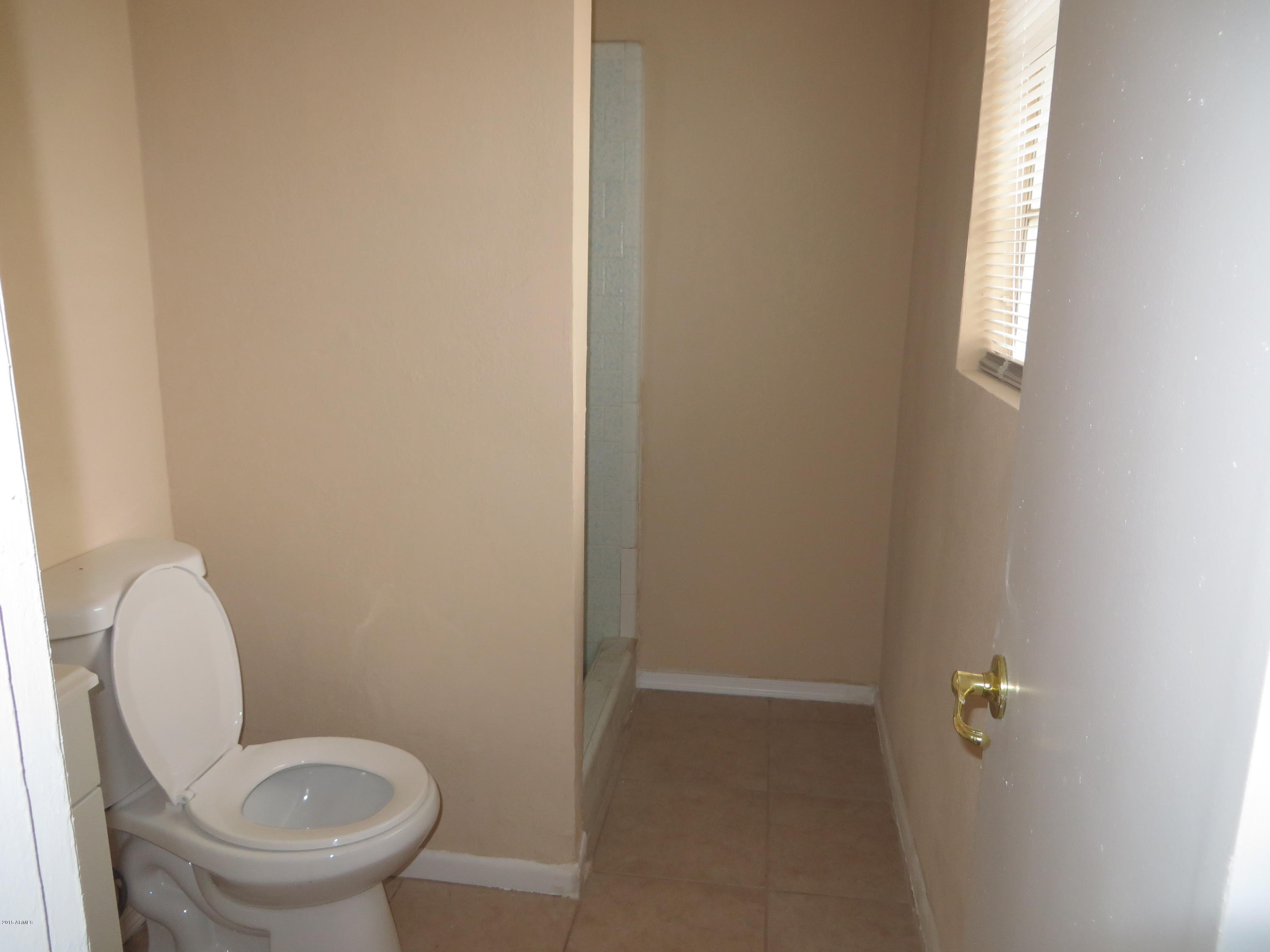 3901 West Rovey Avenue Phoenix, AZ 85019 - Photo 4 of 8 Five
