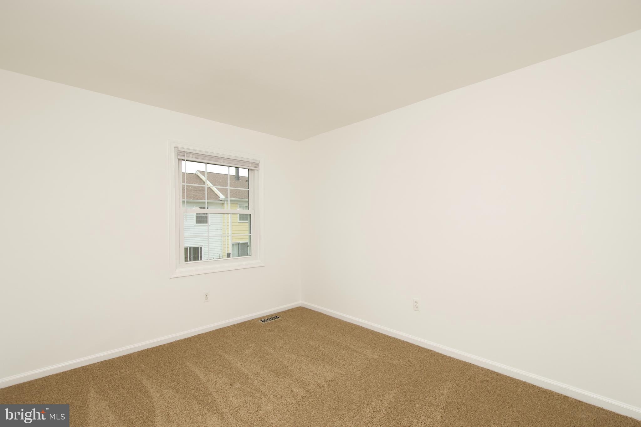 1448 Orleans Court Crofton, MD 21114 - Photo 16 of 32 an empty room with a window