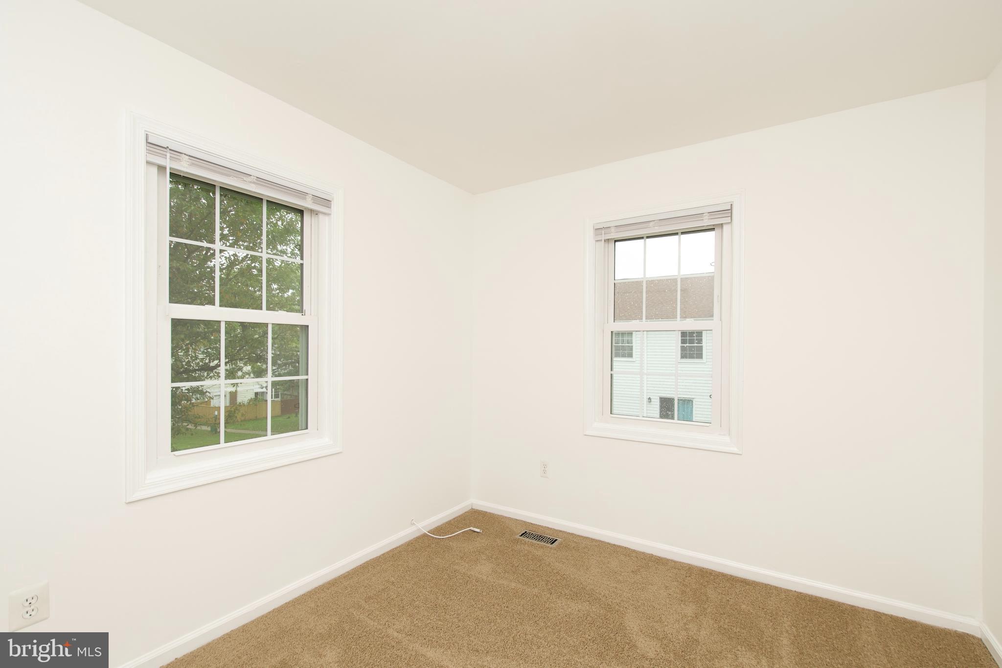 1448 Orleans Court Crofton, MD 21114 - Photo 18 of 32 an empty room with a window