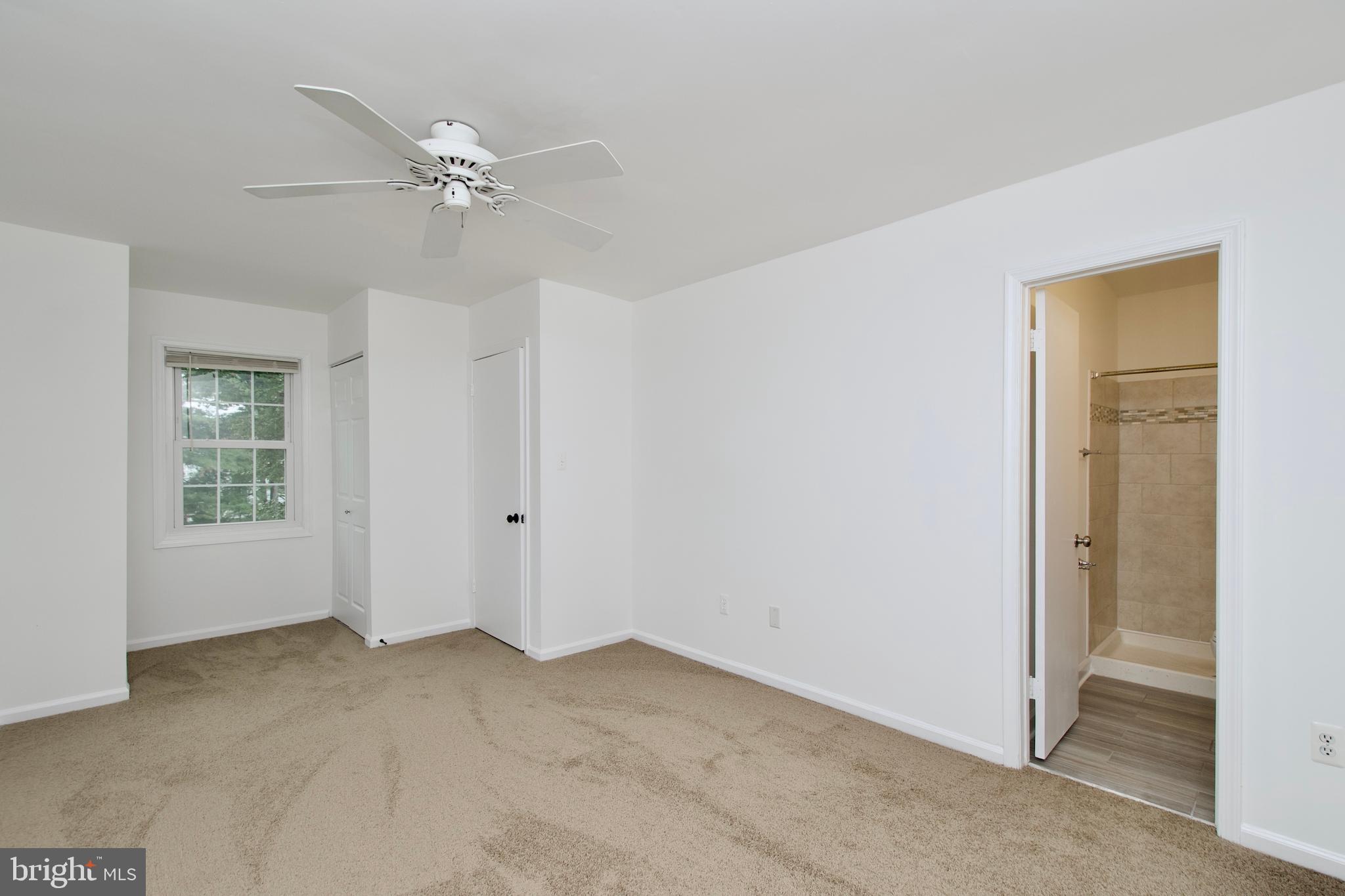 1448 Orleans Court Crofton, MD 21114 - Photo 25 of 32 a view of an empty room with a window
