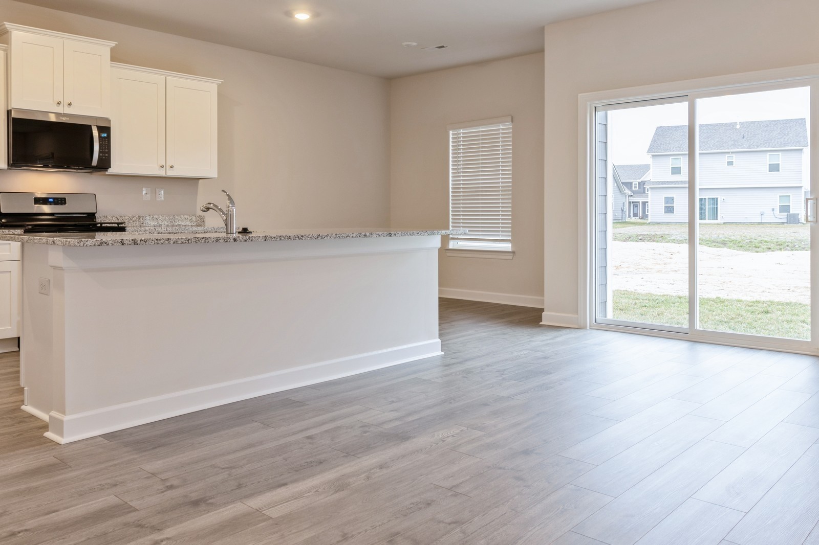 2322 Nabali Way Murfreesboro, TN 37127 - Photo 14 of 22 a view of kitchen with stainless steel appliances granite countertop a stove a sink and a large window