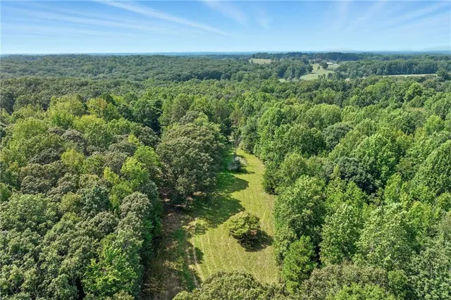 a view of a yard with an outdoor space