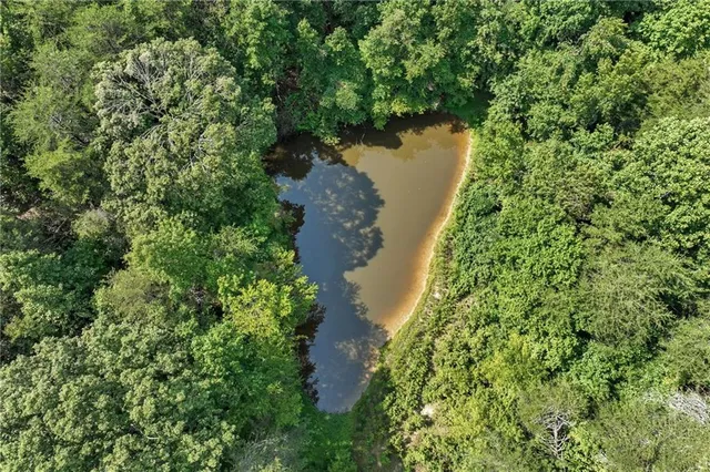 a view of a lake with a house