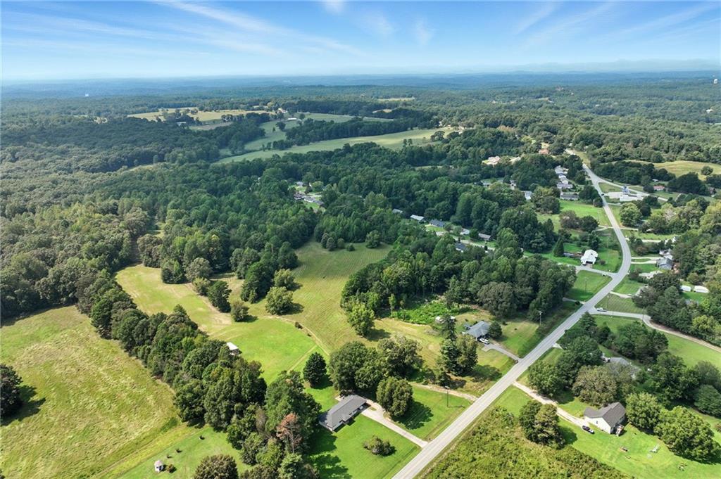 4363 Sardis Road Gainesville, GA 30506 - Photo 22 of 30 an aerial view of residential houses with outdoor space and trees