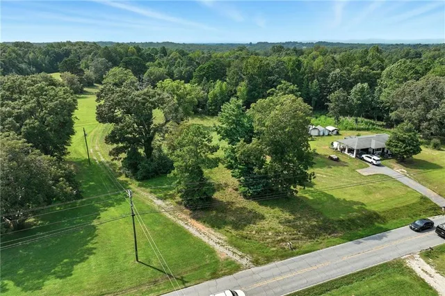 a view of a back yard from a balcony
