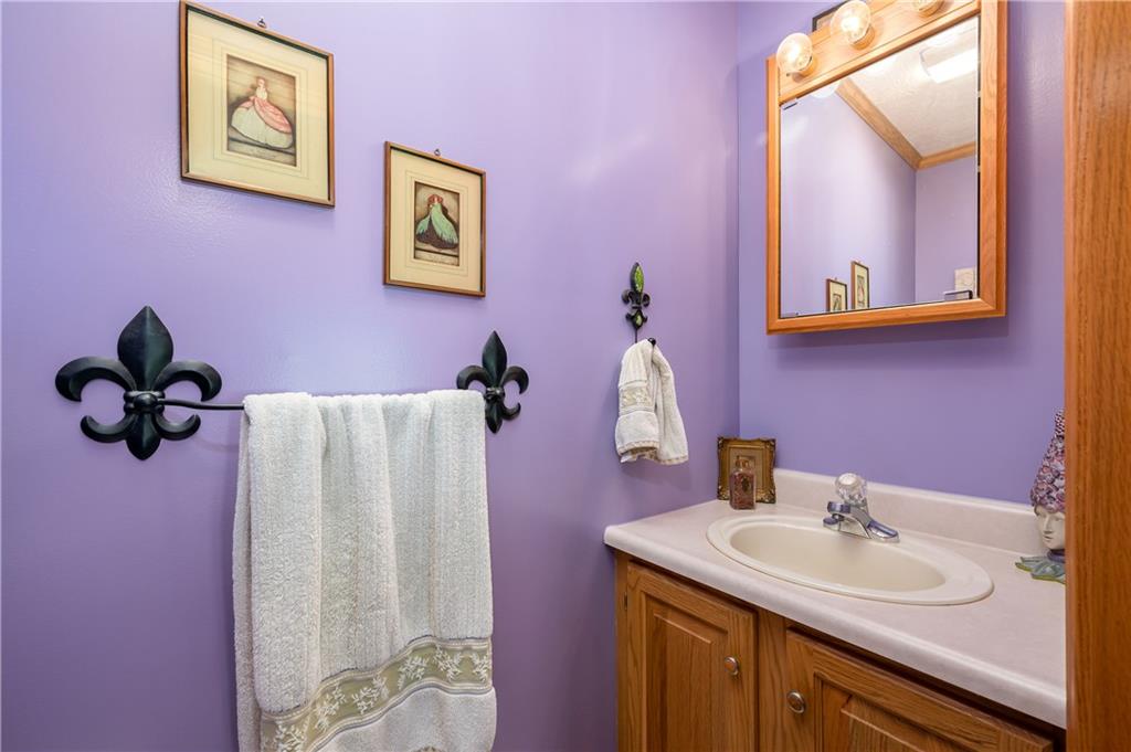 360 Sopher Road Grove City, PA 16127 - Photo 12 of 25 a bathroom with a sink and a mirror