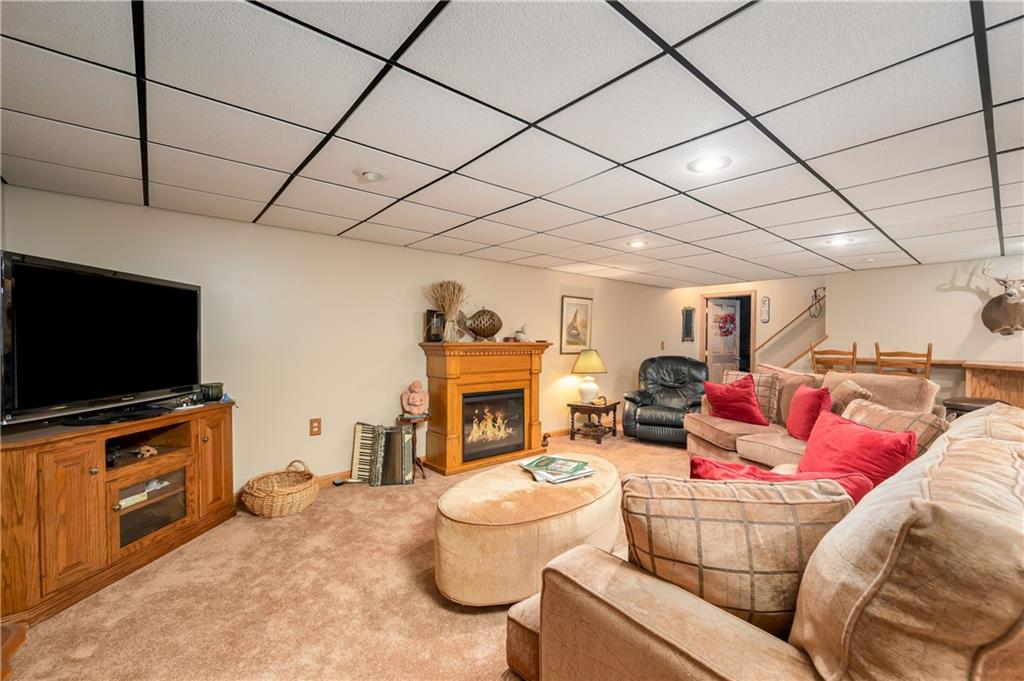 360 Sopher Road Grove City, PA 16127 - Photo 20 of 25 a living room with furniture and a flat screen tv