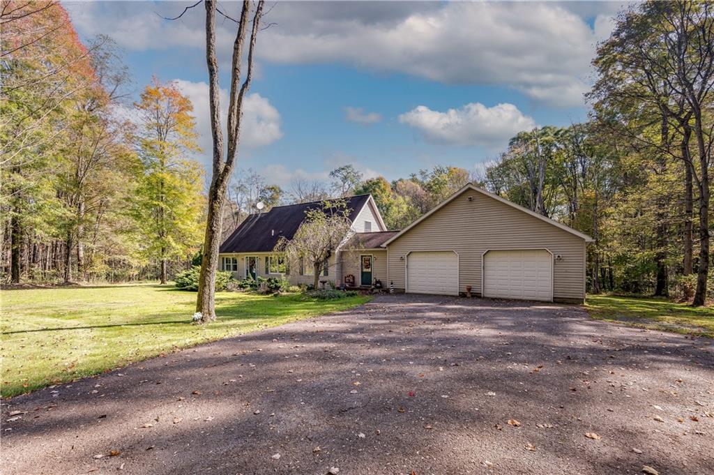 360 Sopher Road Grove City, PA 16127 - Photo 3 of 25 a view of a house with a yard and large trees