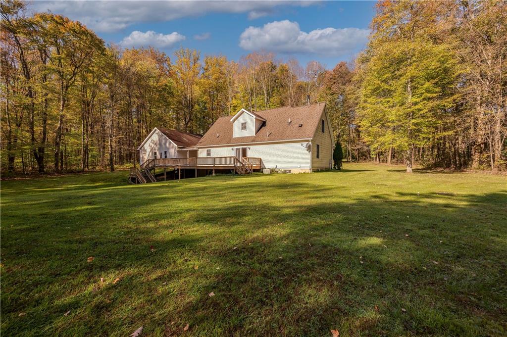 360 Sopher Road Grove City, PA 16127 - Photo 24 of 25 a view of a big house with a big yard and large trees