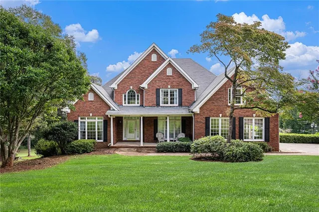 front view of a house with a yard