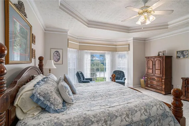 a bed room with a bed and furniture