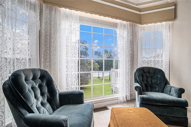 a spacious bathroom with a tub sink double and mirror