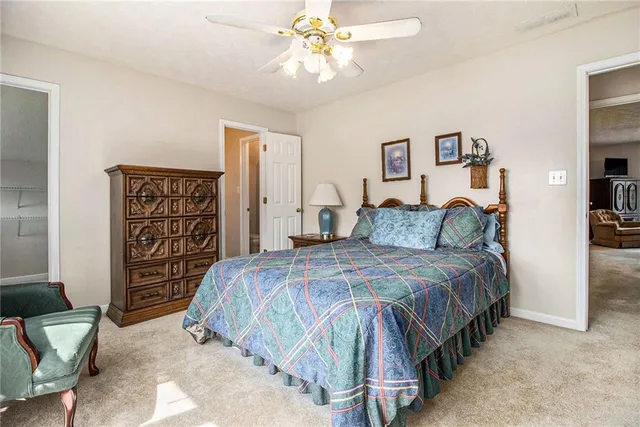 a bathroom with a sink vanity and mirror