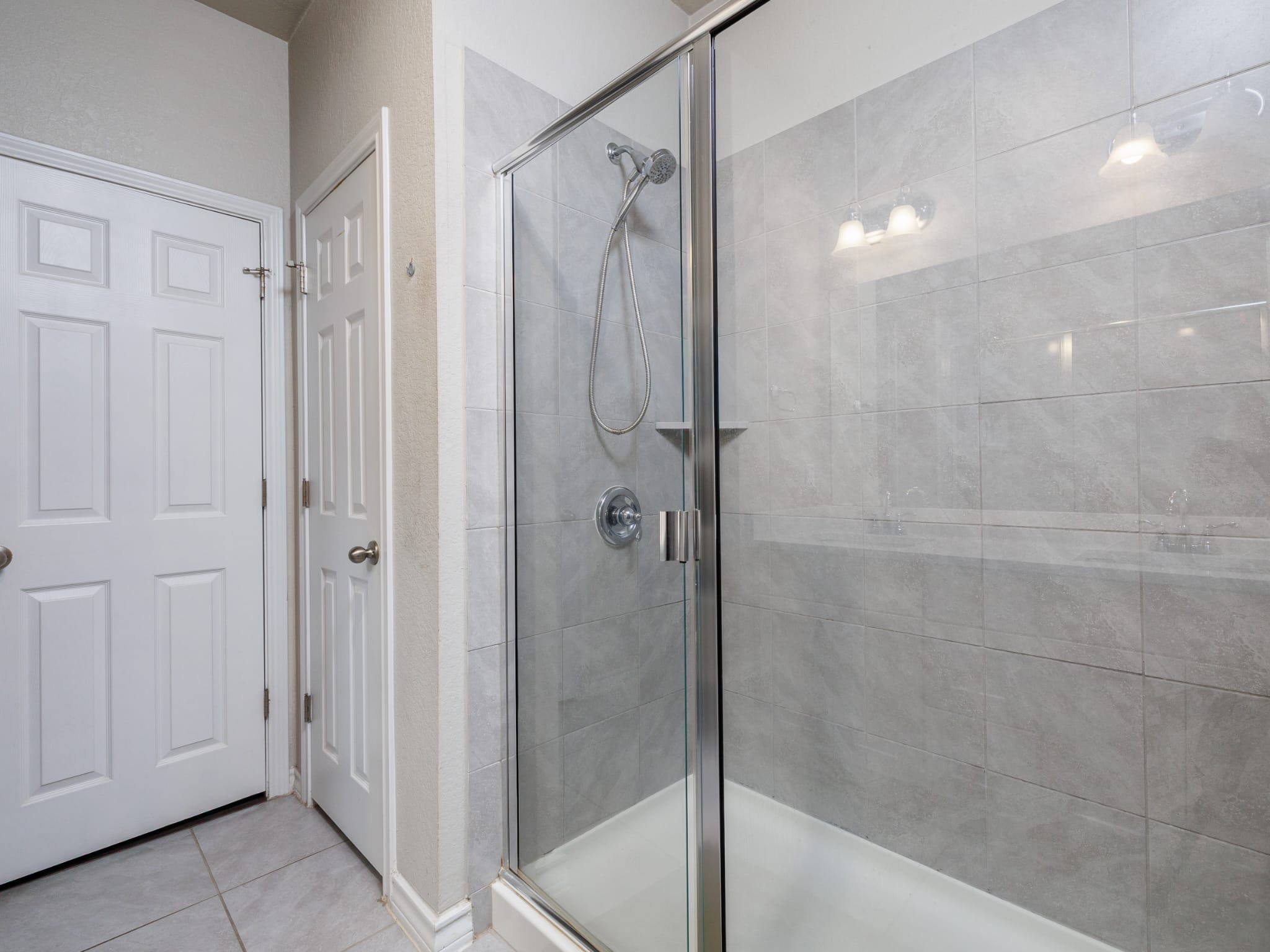1919 Rinker Ranch Drive Austin, TX 78725 - Photo 11 of 30 Full bath with a stall shower and light tile patterned flooring