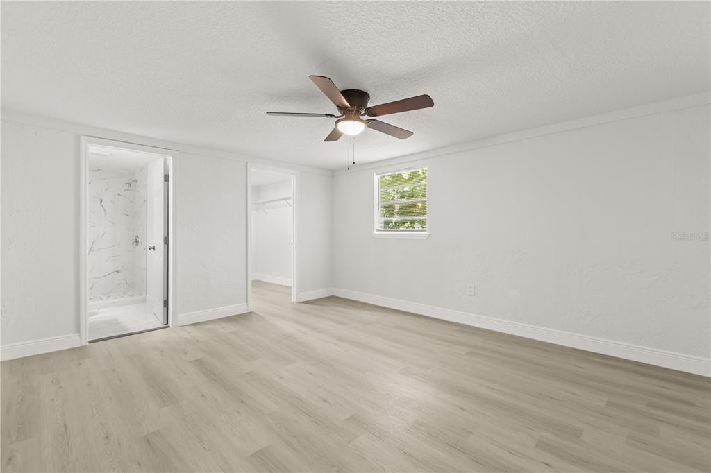 1251 Northwest 23rd Avenue Ocala, FL 34475 - Photo 13 of 34 a view of an empty room with a window