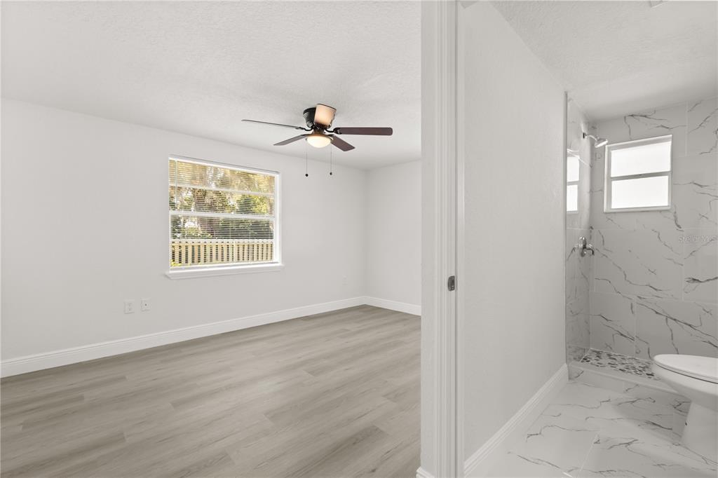 1251 Northwest 23rd Avenue Ocala, FL 34475 - Photo 19 of 34 a view of an empty room with a window