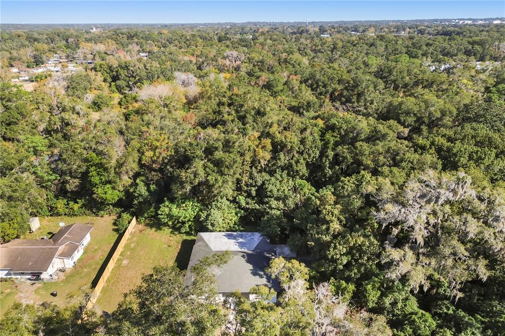 1251 Northwest 23rd Avenue Ocala, FL 34475 - Photo 32 of 34 a view of a yard with an outdoor seating