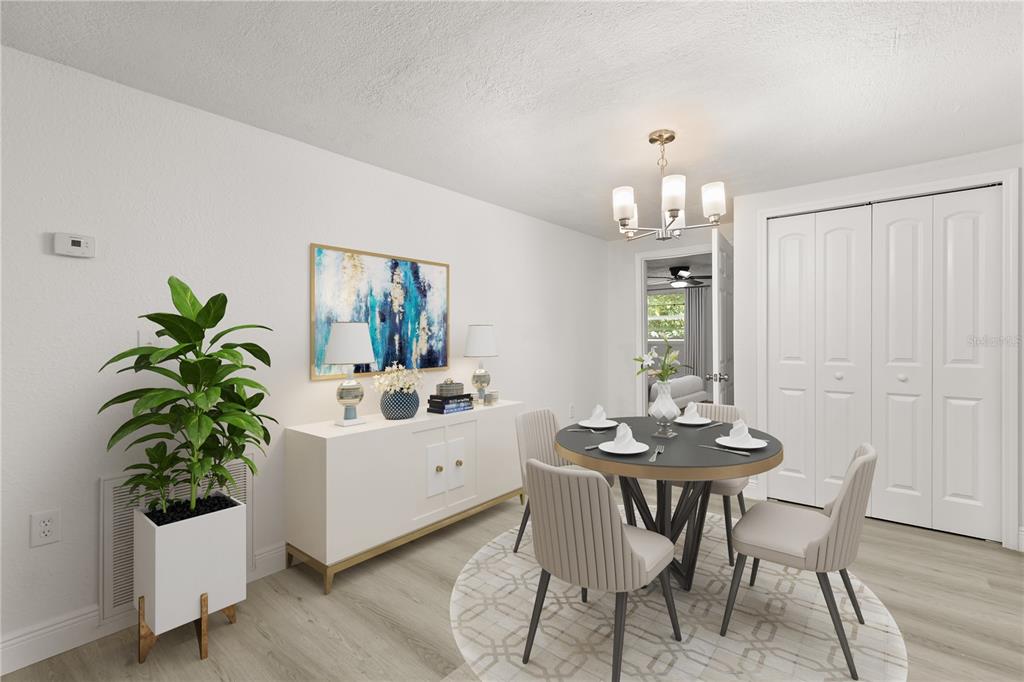 1251 Northwest 23rd Avenue Ocala, FL 34475 - Photo 9 of 34 a view of a dining room with furniture and wooden floor