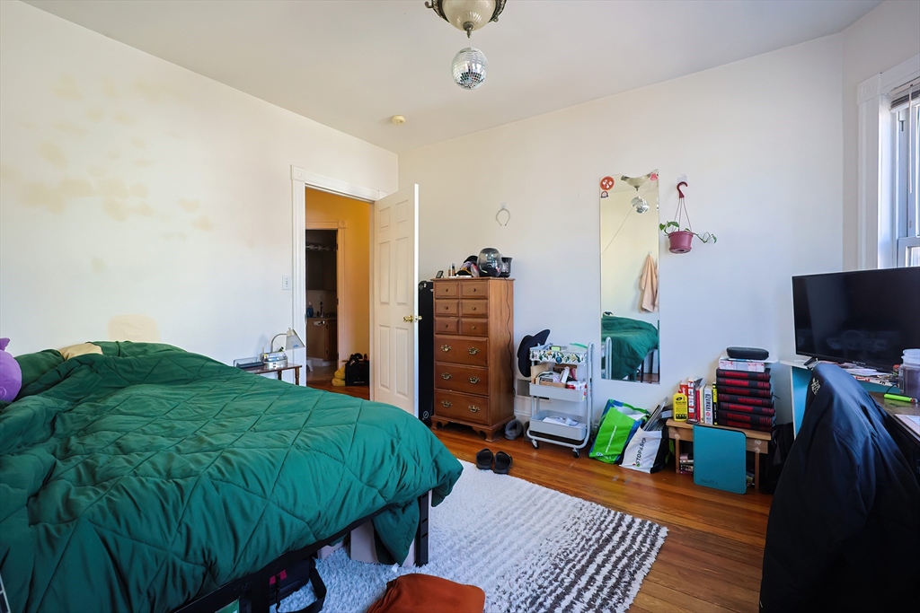 35 Adamson Street Boston, MA 02134 - Photo 15 of 41 a room with furniture and a window