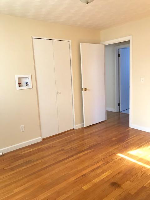 36 Brookside Road Rockland, MA 02370 - Photo 13 of 17 a view of an empty room with wooden floor