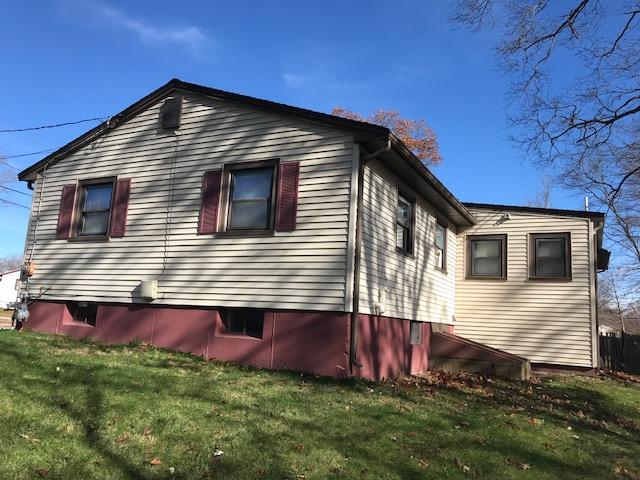 36 Brookside Road Rockland, MA 02370 - Photo 17 of 17 a front view of a house with a yard