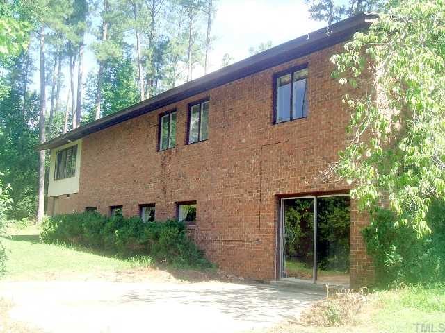 5301 Lead Mine Road Raleigh, NC 27612 - Photo 3 of 11 Walk out to patio from recreation and bonus rooms on lower level.