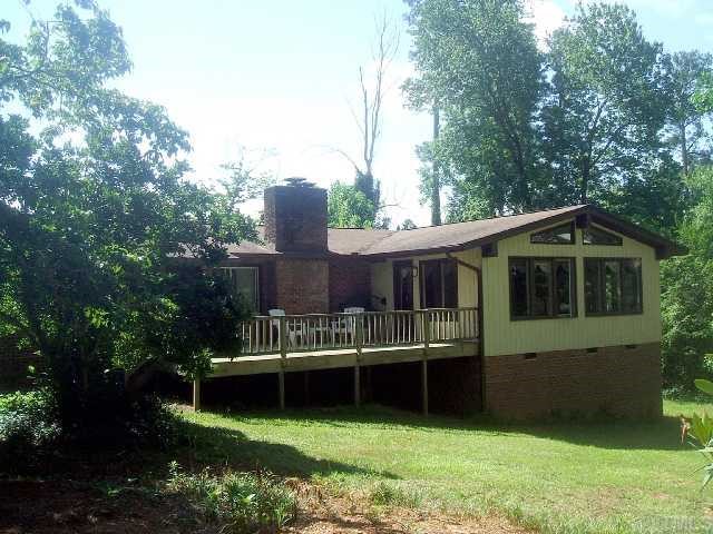 5301 Lead Mine Road Raleigh, NC 27612 - Photo 4 of 11 Private16 x 23 deck off Family Room and Sun Room facing wooded area at rear of lot