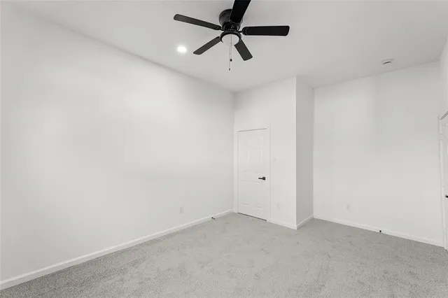a view of a ceiling fan in a room