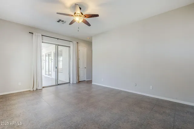 a kitchen with a sink and a stove top oven