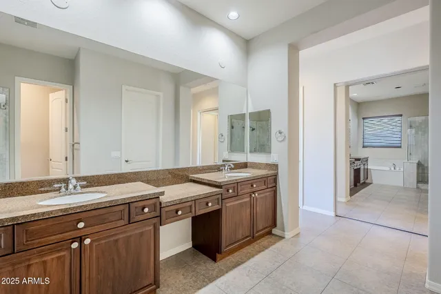 a view of a hallway with wooden shelves