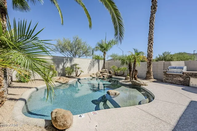 a view of a backyard with a garden