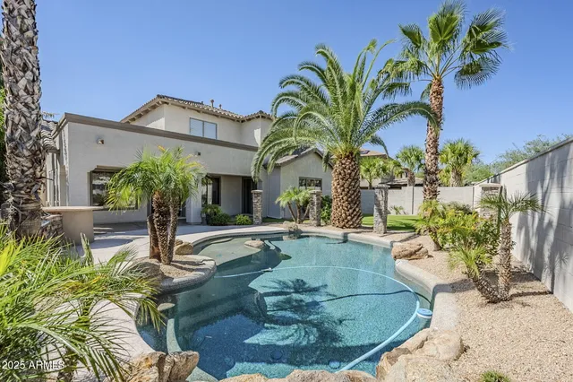 a view of a house with a swimming pool