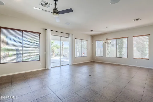 a view of a livingroom with a kitchen