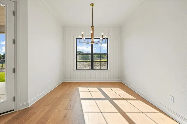a view of a room with windows