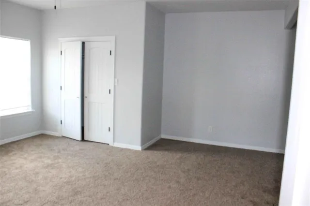 an empty room with closet
