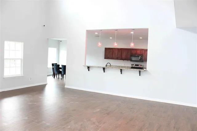 a view of livingroom with furniture and wooden floor