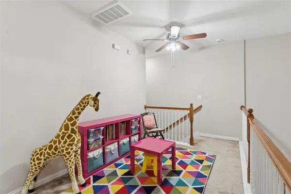a view of a swimming pool with an outdoor seating and a garden