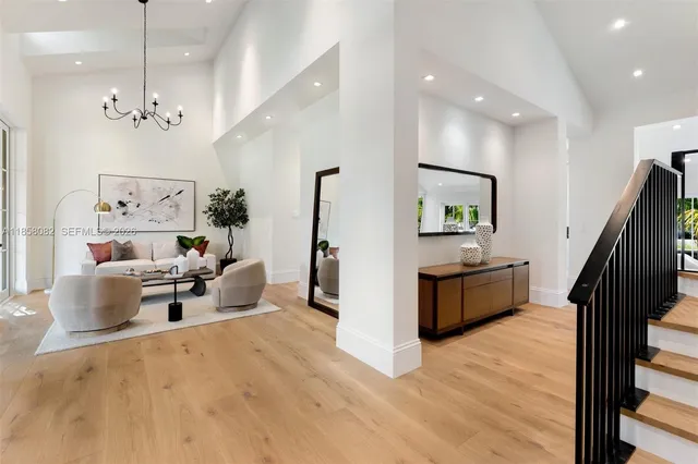 a front view of house with yard and trees