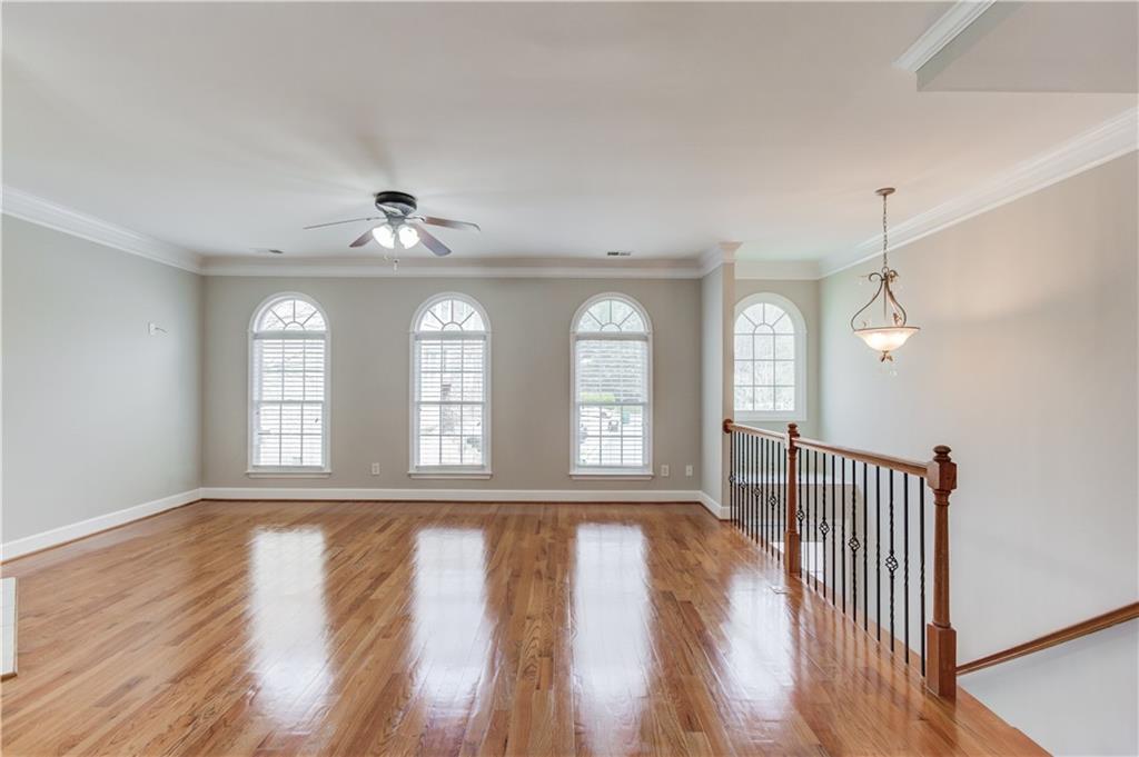 11007 Lorin Way Duluth, GA 30097 - Photo 7 of 30 a view of entryway with wooden floor and fan