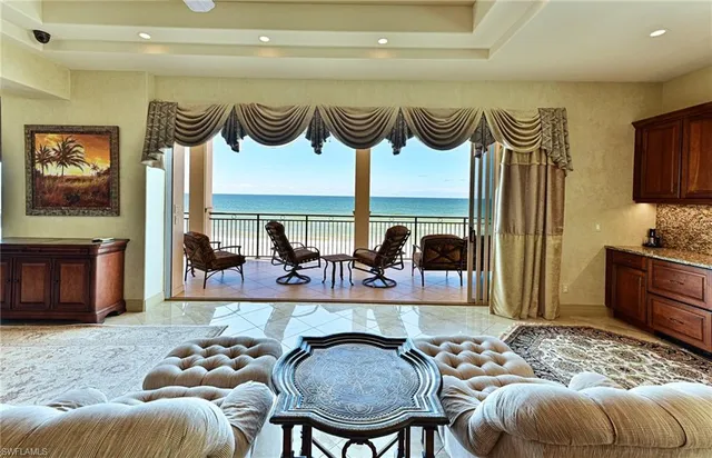 a view of a livingroom with furniture and window