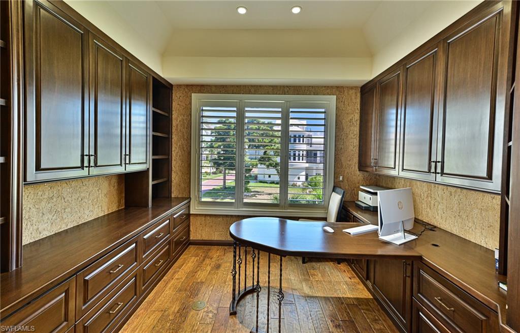 110 St Eustacius Lane Bonita Springs, FL 34134 - Photo 17 of 34 a kitchen with sink a refrigerator and windows