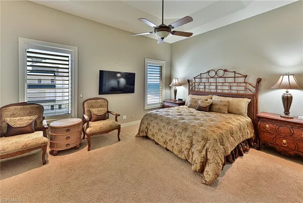 a bedroom with bed and window