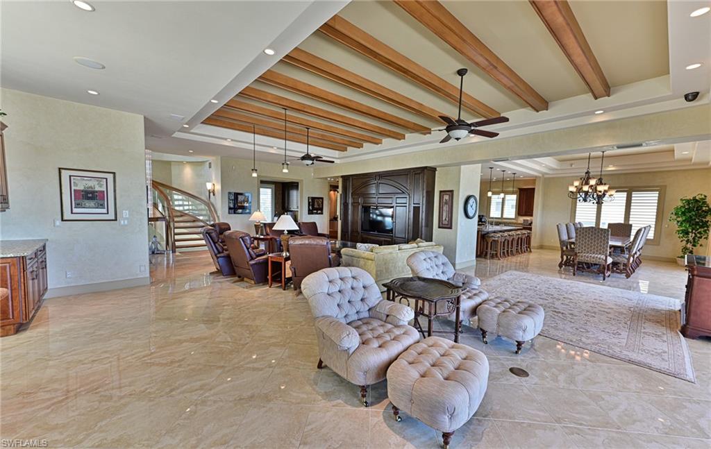 110 St Eustacius Lane Bonita Springs, FL 34134 - Photo 10 of 34 a living room with furniture and a large window