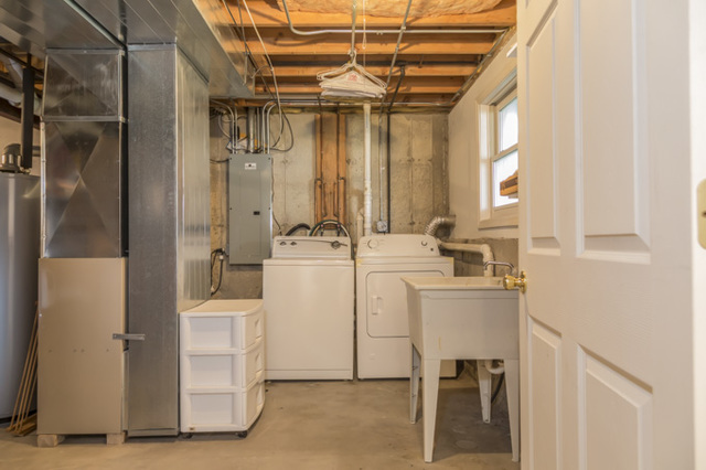101 Barnes Road Elgin, IL 60124 - Photo 19 of 22 a utility room with dryer and washer