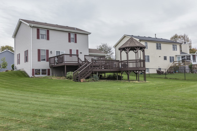 101 Barnes Road Elgin, IL 60124 - Photo 20 of 22 a house view with a outdoor space