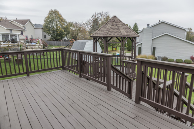 101 Barnes Road Elgin, IL 60124 - Photo 22 of 22 a view of a house with wooden deck