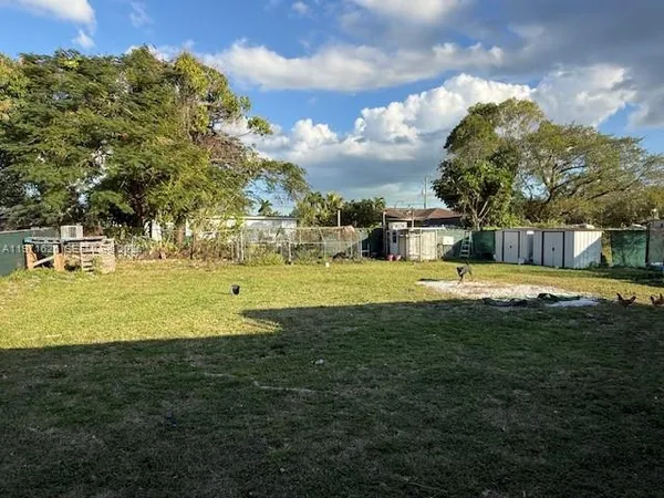 a view of a house with a big yard