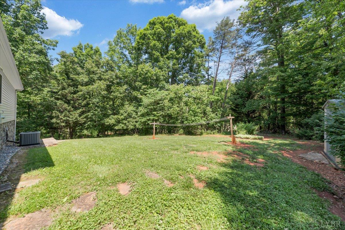1124 Homeplace Road Bedford, VA 24523 - Photo 38 of 47 a view of a big yard with a tree