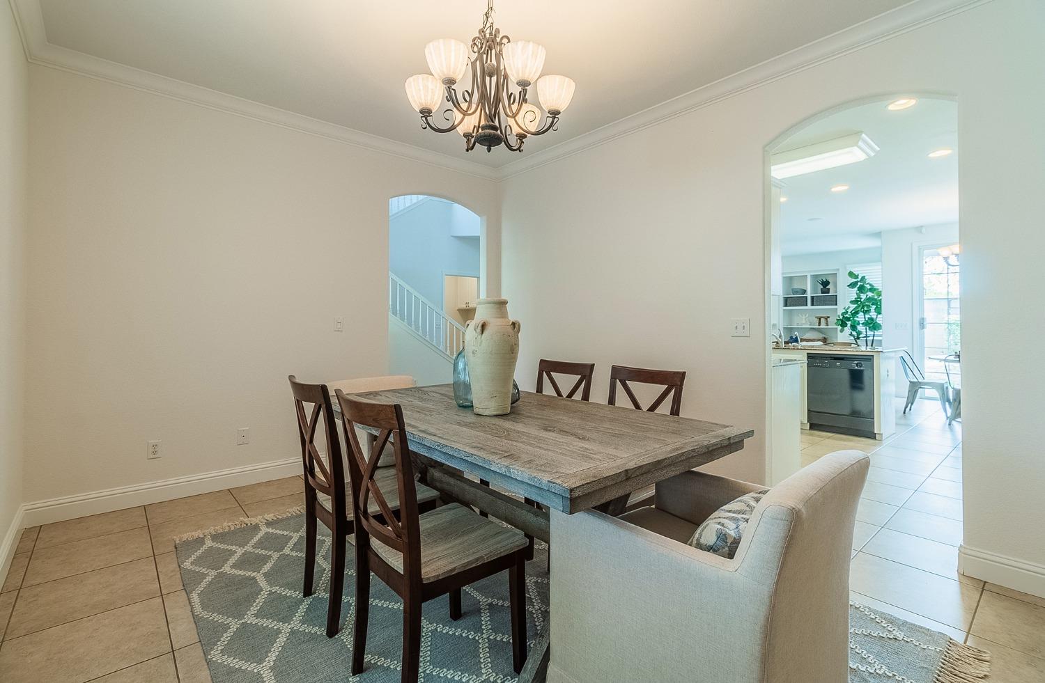 2595 Powers Avenue Coalinga, CA 93210 - Photo 16 of 34 a view of a dining room with furniture and chandelier